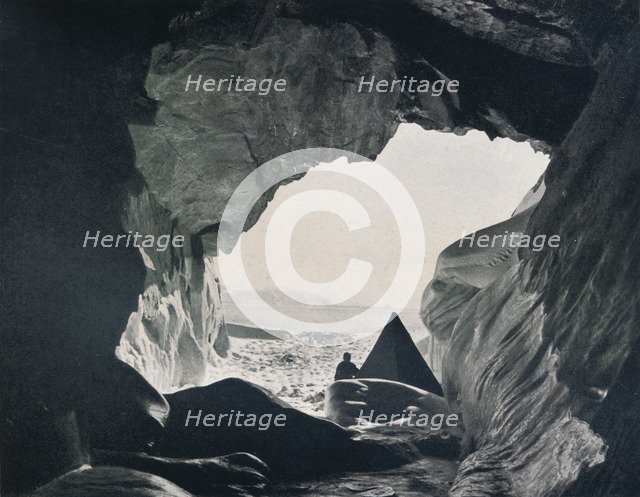 'Camp in the Cave Under Penelope Point', 1912, (1913). Artist: G Murray Levick.