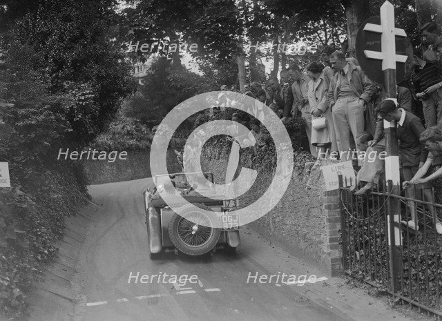 MG TA of CG Gibbs competing in the MCC Torquay Rally, 1938. Artist: Bill Brunell.