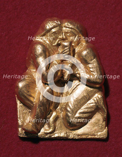 Scythian plaque showing two men drinking from a horn, 4th century BC Artist: Unknown