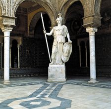 Roman Sculpture depicting Palas Ateneas in the main courtyard of the House of Pilate in Seville.