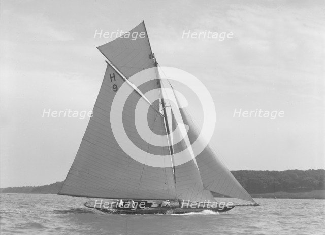 The gaff rigged 8 Metre class 'Termagent' (H9) sailing close-hauled, 1911. Creator: Kirk & Sons of Cowes.
