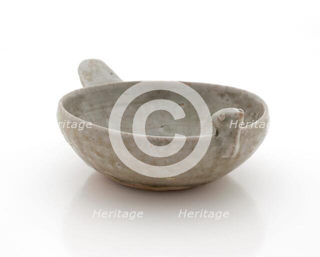 Shallow dish with bird head and tail, 265-316. Creator: Unknown.