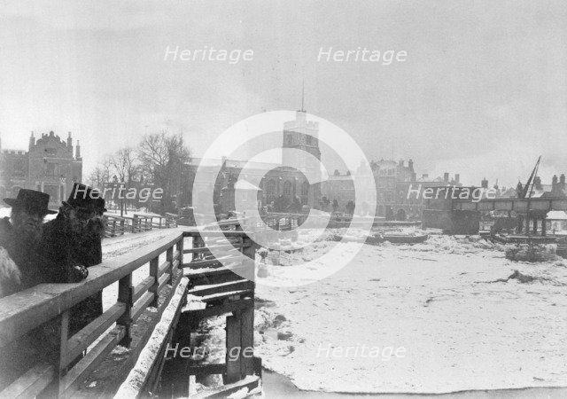 Old Putney Bridge with the river frozen, Putney, Wandsworth, London, c1881. Artist: Unknown
