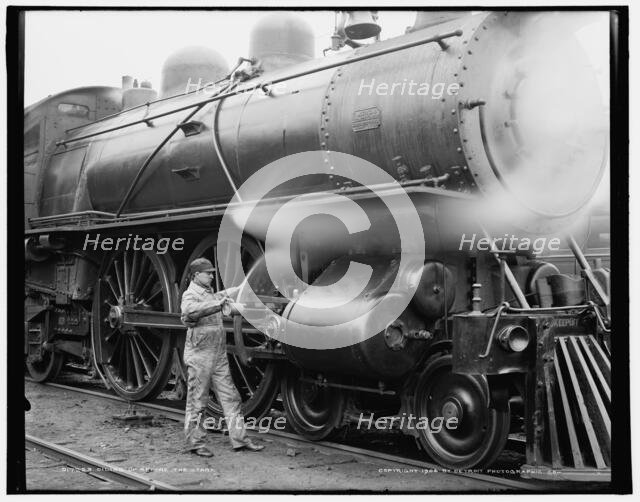 Oiling up before the start, c1904. Creator: Unknown.