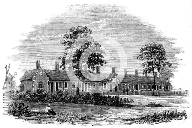 New Almshouses at Old Buckenham, near Attleborough, Norfolk, founded by Mr. Robert Cocks, 1861. Creator: Unknown.