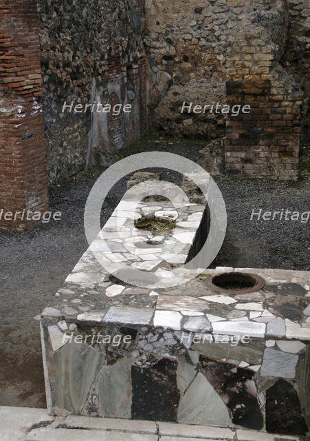 Marble-covered counter, Thermopolium, Pompeii, Italy, 2009.  Creator: LTL.