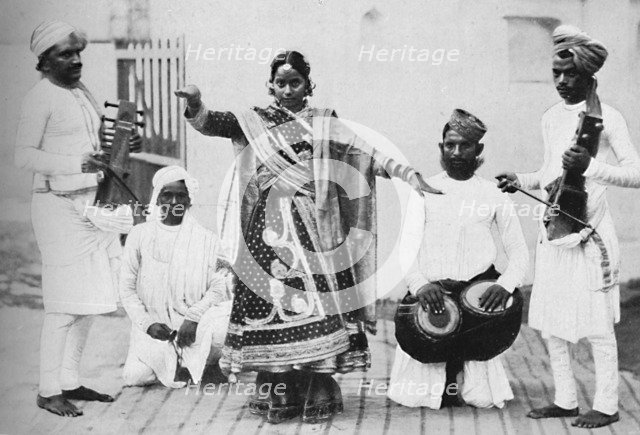 Nautch girl with musicians, 1902. Artist: Kapp & Co.
