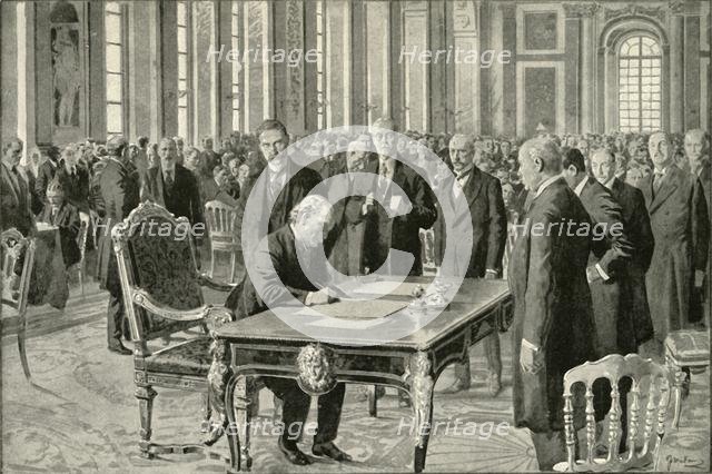 'The Prime Minister of Great Britain Signing the Peace Treaty', 1919. Creator: Unknown.
