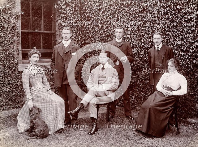Claybury Asylum, Woodford, Essex: six members of staff, and a dog, (1893?). Creator: London & County Photographic Co.