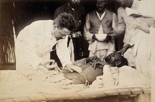 Man being injected by doctor, during the outbreak of bubonic plague in Karachi, India, 1897. Creator: Unknown.