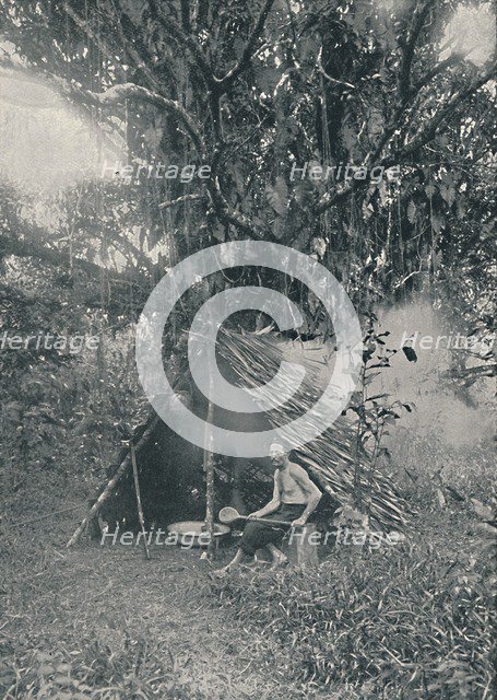 'Smoking Rubber', 1916. Artist: Unknown.