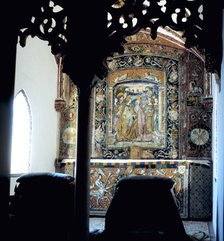 Inside the Alcazar of Seville, oratory of the Catholic Monarchs with a beautiful altar in ceramic…