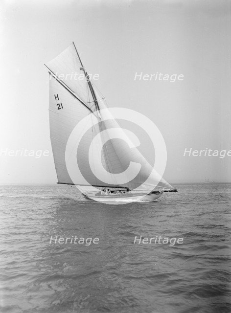 The 8 Metre 'Le Jade' (H21) sailing in fine conditions, 1912. Creator: Kirk & Sons of Cowes.