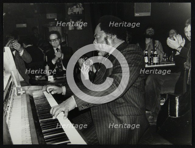 Roland Hanna playing the piano before an appreciative audience, 1980. Artist: Denis Williams
