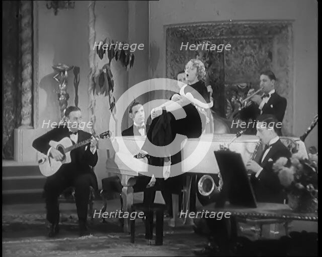 The Singer Elsie Carlisle and Her Band Performing a Song About Her Boyfriend Who Has Gone..., 1931. Creator: British Pathe Ltd.