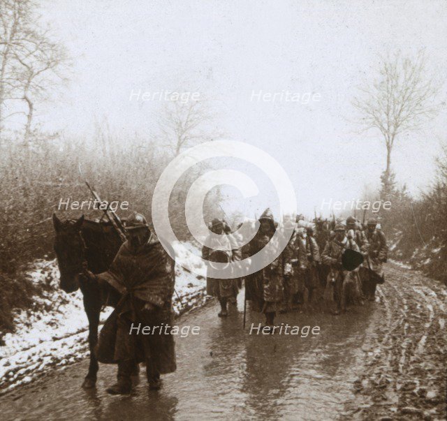 Advancing in the snow, Artois, northern France, c1914-c1918. Artist: Unknown.