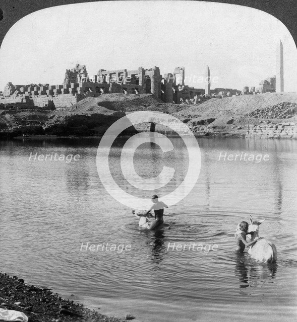 'Looking across the Sacred Lake to the great temple at Karnak, Thebes, Egypt', 1905.Artist: Underwood & Underwood
