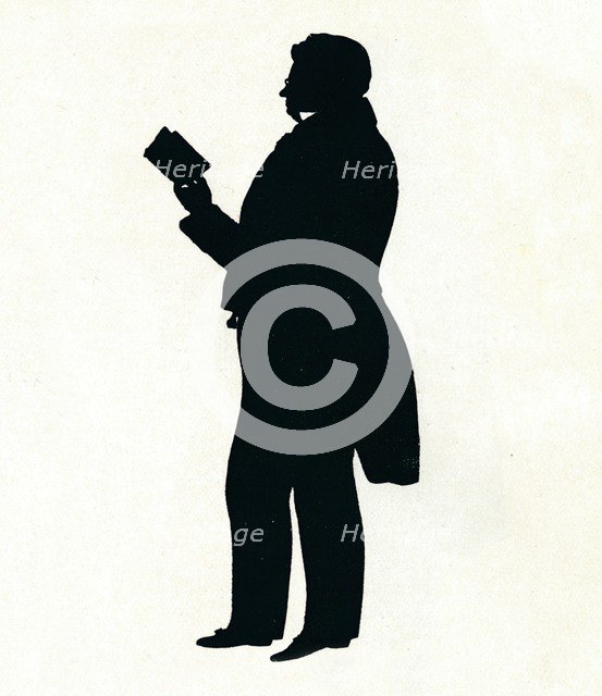 'Supposititious Silhouette of William Makepeace Thackeray Reading', c19th century. (1911) Artist: Unknown.