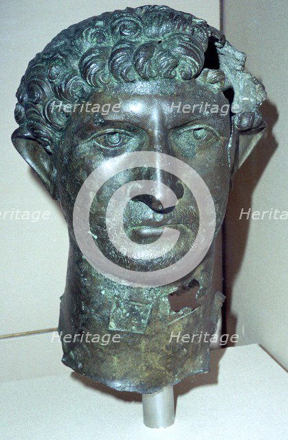 Bronze head from a statue of the Roman Emperor Hadrian, Roman Britain, 2nd century. Artist: Unknown