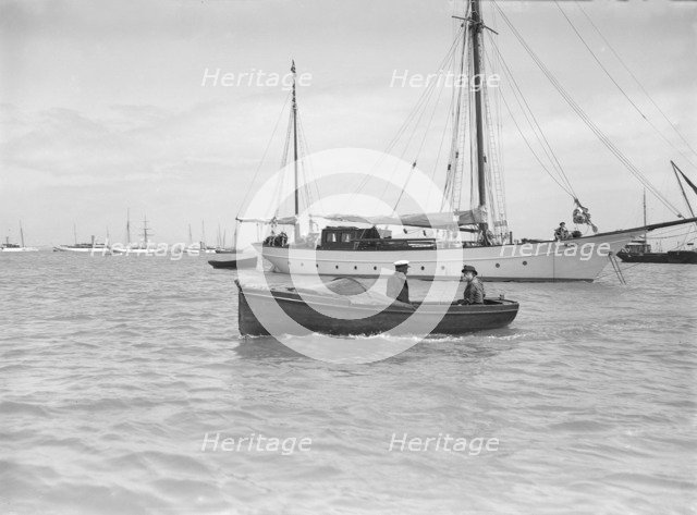 Motor boat 'Hubble-Bubble' and mariners, 1911. Creator: Kirk & Sons of Cowes.