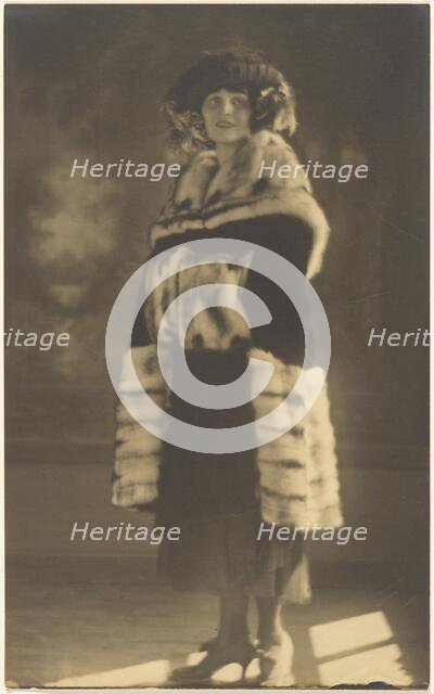 Portrait of a Woman in Fur Coat with Muff, 1907-1943. Creator: Louis Fleckenstein.