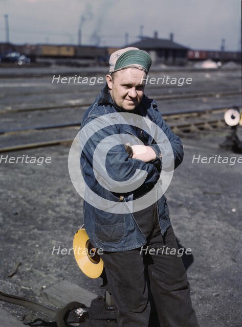 A.S. Gerdee, of 3251 Maypole(?) Street, working as a switchman..., Chicago, Ill., 1943. Creator: Jack Delano.
