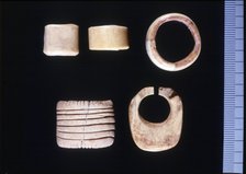Bone rings or pendants from the Cova de l'Or, Beniarres (Alicante). Made with the technique of su…