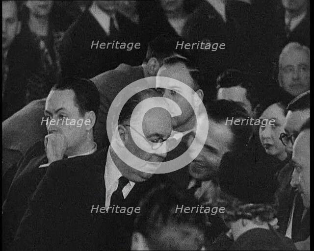 Bruno Richard Hauptmann Speaking To Attorney Edward J. Reilly During His Trial in the Lind..., 1930s Creator: British Pathe Ltd.