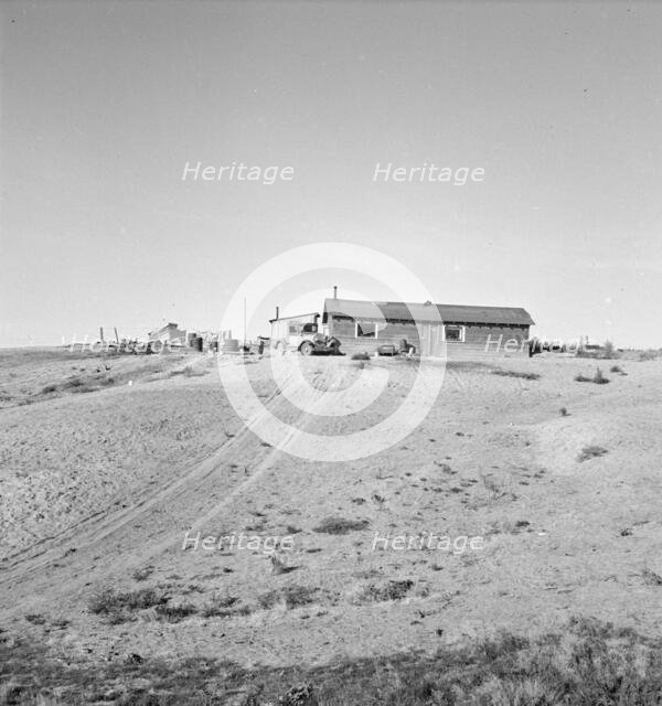 The Browning home, a partial dugout, Dead Ox Flat, Malheur County, Oregon, 1939. Creator: Dorothea Lange.