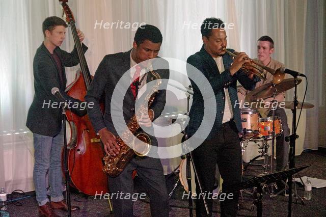Xhosa Cole, Jay Phelps, James Owston, Xhosa Cole Quartet, Watermill Jazz Club, Dorking, Surrey, 2020 Creator: Brian O'Connor.