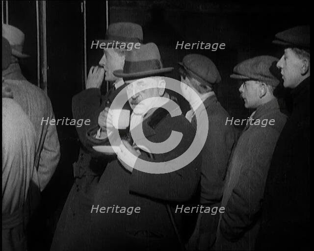 Author Sir James Barrie Drinking a Cup of Tea Surrounded By Male Civilians, 1924. Creator: British Pathe Ltd.