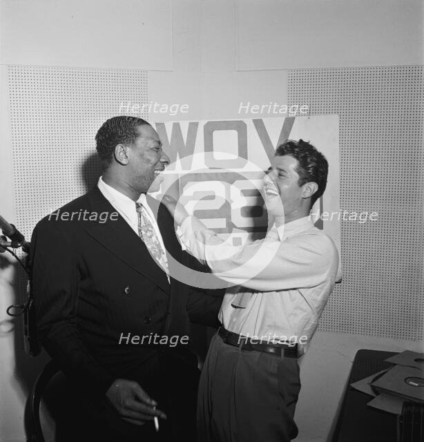 Portrait of Sid Catlett and Freddie Robbins, WOV office, New York, N.Y., ca. June 1947. Creator: William Paul Gottlieb.