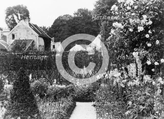 Pavilion Colombe, Mrs. Edith Wharton's villa, St. Brice-sous-Forêt, France, with garden..., 1925. Creator: Frances Benjamin Johnston.