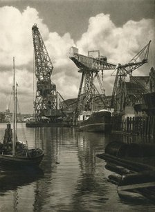 'Kiel - Giant floating crane of the Germania Shipbuilding Yards', 1931. Artist: Kurt Hielscher.