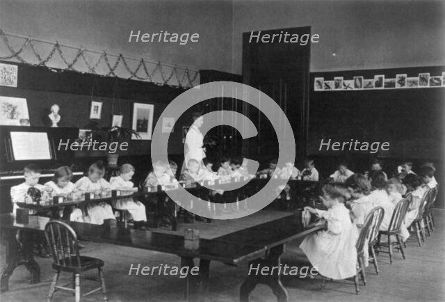 Washington, D.C. public schools - 5th Division class playing with blocks, (1899?). Creator: Frances Benjamin Johnston.