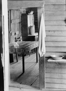 Washstand in the dog run and kitchen of Floyd Burroughs' cabin, Hale County, Alabama, 1936. Creator: Walker Evans.