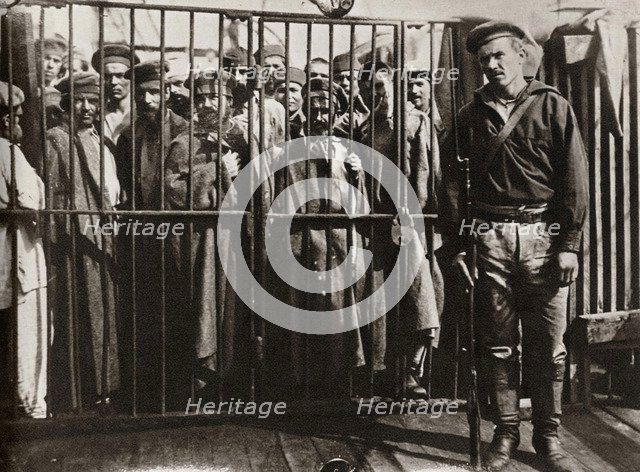 Caged prisoners cage on the steamer 'Petersburg' on the way to Sakhalin, Russia, 1890. Artist: Anton Chekhov