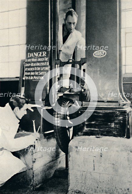 'An Impact Test in the Dunlop Test House', 1937. Artist: Unknown.