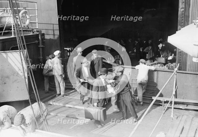 Boarding the MADONNA, 1912. Creator: Bain News Service.
