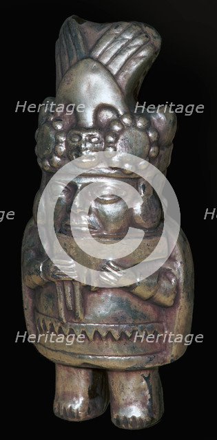 Incan silver figure of a man with pan-pipes. Artist: Unknown