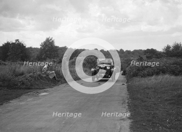 Car taking part in a First Aid Nursing Yeomanry trial or rally, 1931. Artist: Bill Brunell.