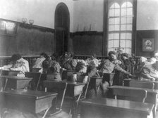Washington, D.C. public schools, Normal School - girls stretching and relaxing, (1899?). Creator: Frances Benjamin Johnston.