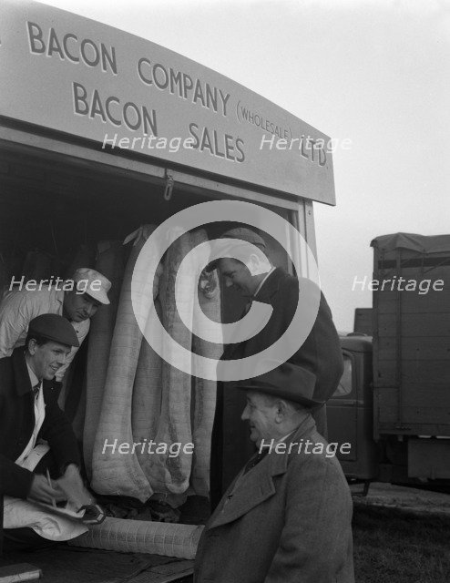 Buying wholesale meat from a Danish Bacon Company lorry, Barnsley, South Yorkshire, 1961. Artist: Michael Walters