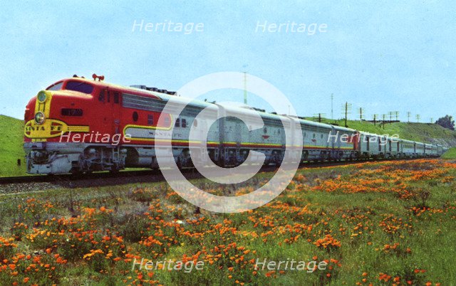 Santa Fe's 'Super Chief' passing a field of California poppies, 1956. Artist: Unknown