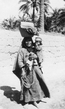 Arab woman and child, 1917-1919. Artist: Unknown