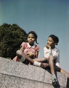 Two little girls in a park near Union Station, Washington, D.C., ca. 1943. Creator: Unknown.