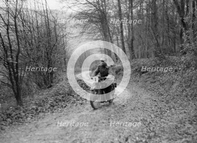 Motorcycle ridden by RD Quincy competing in the Inter-Varsity Trial, November 1931. Artist: Bill Brunell.