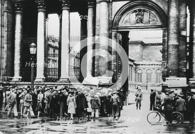 Queue outside the Bureau of Information for civilians in the Chamber of Deputies, Paris, July 1940. Artist: Unknown