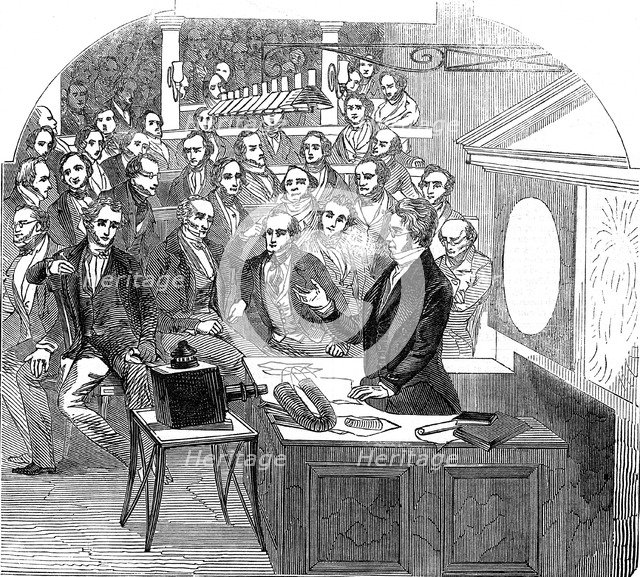 Michael Faraday lecturing on electricity and magnetism, Royal Institution, London, 1846. Artist: Unknown