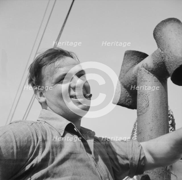 On board the fishing boat Alden, out of Gloucester, Massachusetts, 1943. Creator: Gordon Parks.